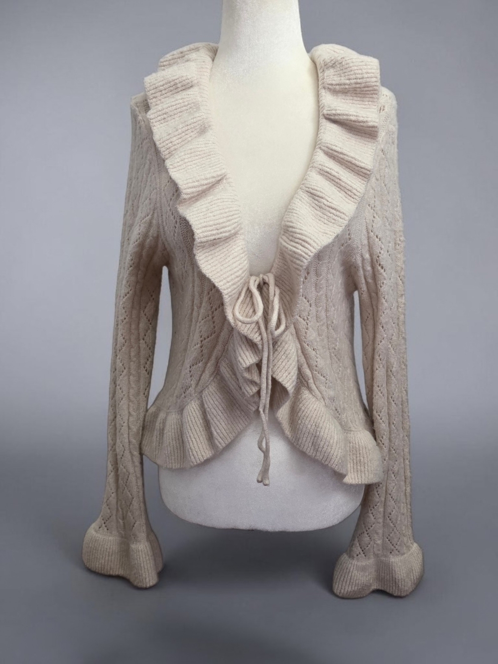 Francesca's Collections Cream Ruffled Cable-Knit Tie-Front Cardigan